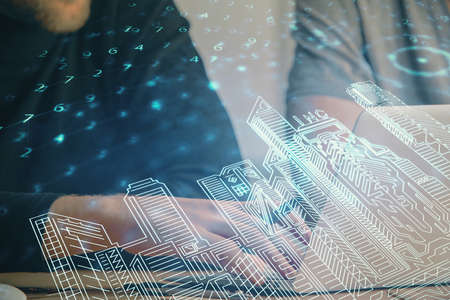 High tech city drawing with businessman working on computer on background. Smartcity concept. Double...