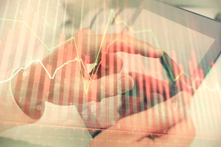 Multi exposure of mans hands holding and using a phone and financial chart drawing. Market analysis...