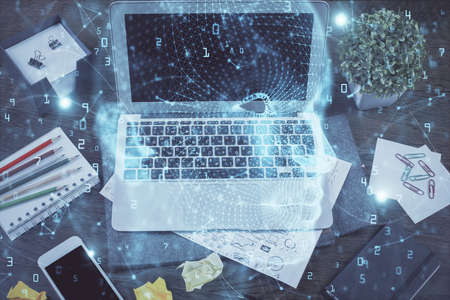 Multi exposure of work space with computer and human brain hologram. Brainstorm concept.の写真素材