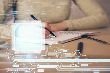 Double exposure of writing hand on background with data technology hologram. Big data concept.