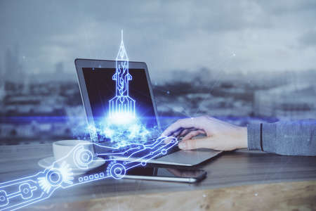 Start up drawings with businessman working on computer on background. Teamwork concept. Double exposure.の写真素材