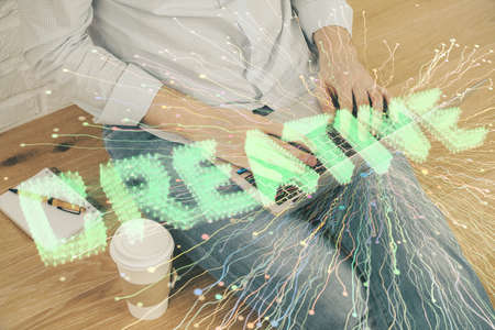 Start up drawings with businessman working on computer on background. Teamwork concept. Double...