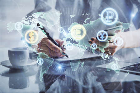 Double exposure of financial graph sketch hologram and woman holding and using a mobile device....