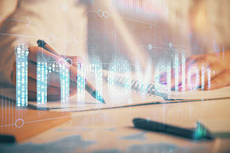 Multi exposure of womans writing hand on background with data technology hologram. Concept of...