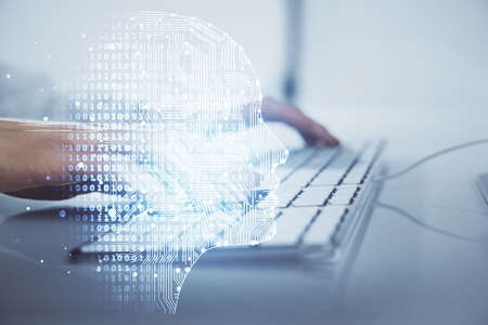 Businessman with computer background with brain theme hologram. Concept of brainstorm. Multi...