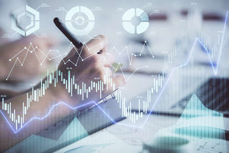 Double exposure of forex graph drawing over people taking notes background. Concept of financial...