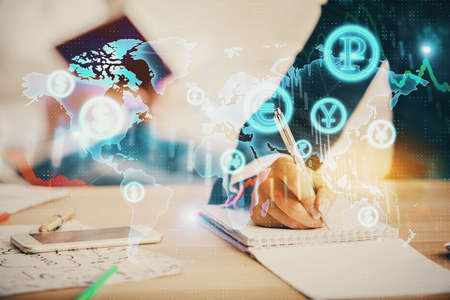 Double exposure of forex chart drawing over people taking notes background. Concept of financial...
