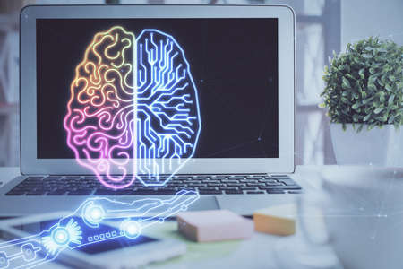 Double exposure of work space with computer and human brain drawing hologram. Brainstorm concept.の写真素材