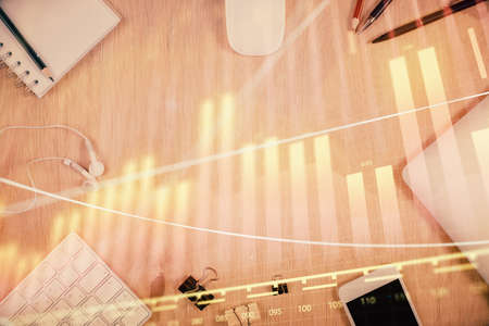 Multi exposure of forex graph hologram over desktop with phone. Top view. Mobile trade platform...