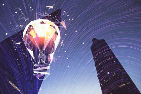 Multi exposure of bulb hologram drawing and cityscape background. Concept of idea.