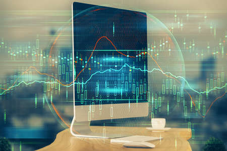 Multi exposure of chart and financial info and work space with computer background. Concept of...