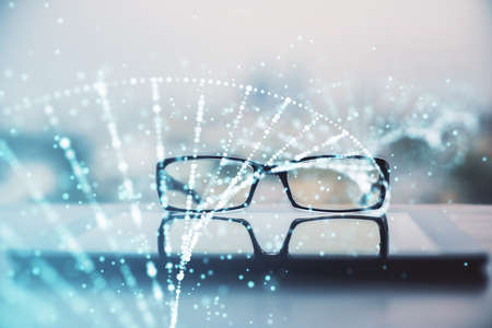 DNA drawing with glasses on the table background. Concept of bioengineering. Double exposure.の写真素材