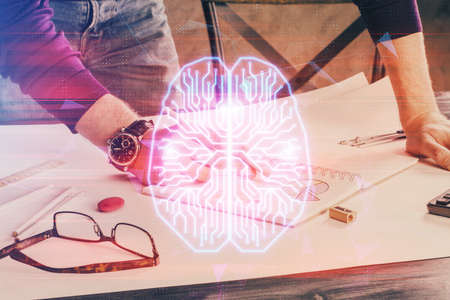 Mans hands withbrain double exposure drawing. Concept of human learning.の写真素材