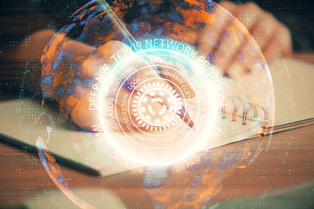 Tech theme hologram over womans hands taking notes background. Concept of hightech. Double exposure