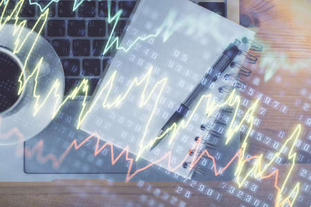 Multi exposure of forex chart drawing and work table top veiw. Concept of financial analysis.