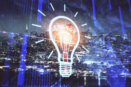 Multi exposure of bulb hologram drawing and cityscape background. Concept of idea.の写真素材
