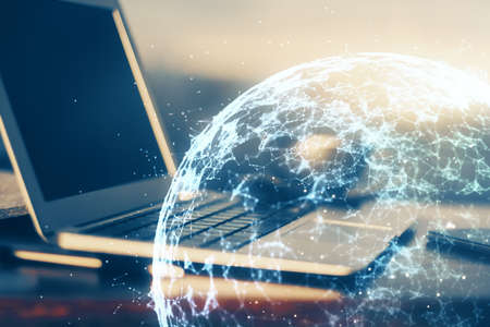 Computer on desktop with social network hologram. Multi exposure. Concept of international people...