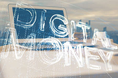Double exposure of blockchain theme hologram and table with computer background. Concept of bitcoin crypto currency.の写真素材