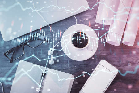 Multi exposure of forex graph drawing over desktop background with computer. Concept of financial analysis. Top view.の写真素材