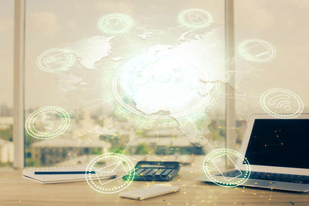 Computer on desktop with social network hologram. Multi exposure. Concept of international people...