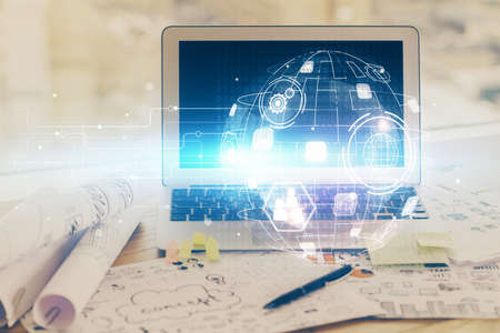 Computer on desktop with social network hologram. Multi exposure. Concept of international people...