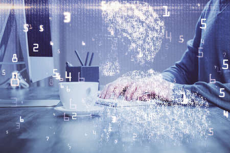 Technology theme hologram with man working on computer on background. High tech concept. Double...