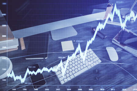 Multi exposure of forex graph and work space with computer. Concept of international online trading.