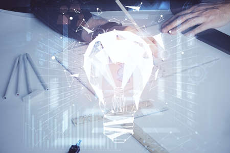 Innovative your business. Idea concept icon on writing mans hand background. Multi exposure.