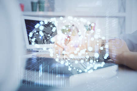 Multi exposure of writing hand on background with brain hologram. Concept of learning.