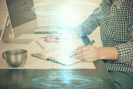 Businessman working on DeskTop with technology theme drawing. Concept of big data. Double exposure.