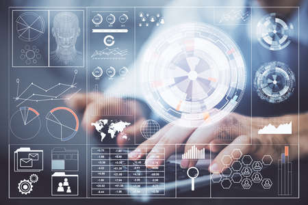 Multi exposure of data internet theme hologram with man working on computer on background. Concept...