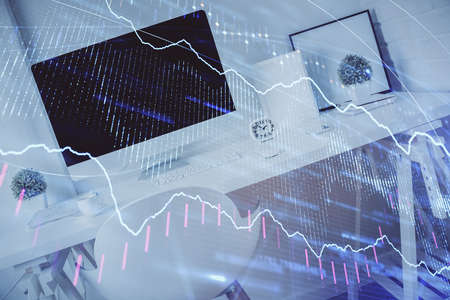 Double exposure of financial graph drawing and office interior background. Concept of stock market.