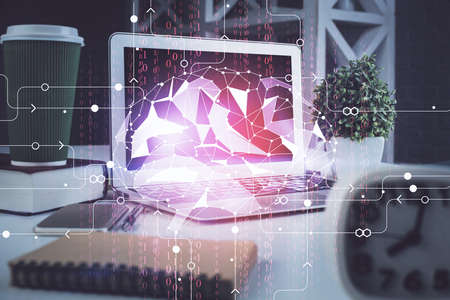 Double exposure of work space with computer and human brain drawing hologram. Brainstorm concept.