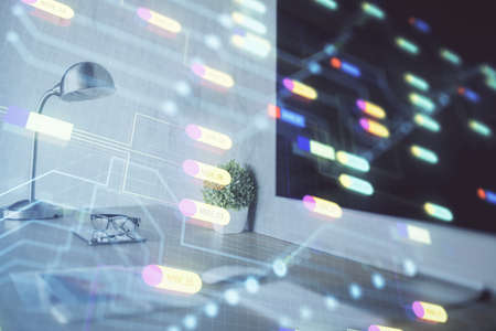 Double exposure of desktop computer and technology theme hologram. Concept of software development.