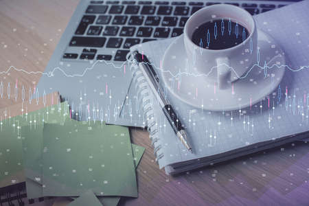 Double exposure of forex chart drawing and desktop with coffee and items on table background....