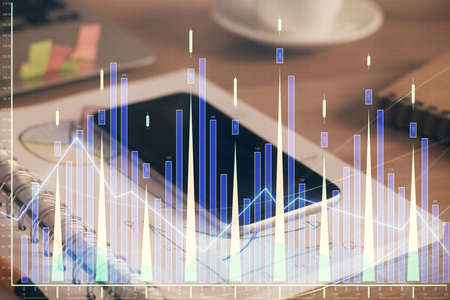 Double exposure of forex chart drawing and cell phone background. Concept of financial data analysis