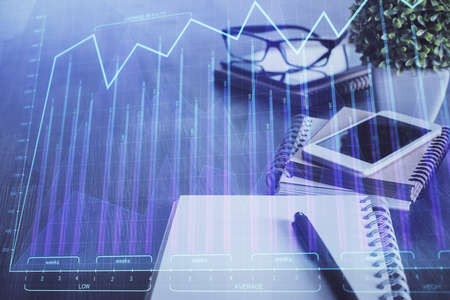 Double exposure of forex chart drawing and cell phone background. Concept of financial trading