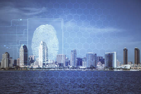 Double exposure of finger print hologram and cityscape background. Concept of personal security.の写真素材