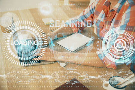 Businessman with computer background with technology theme hologram. Concept of big data. Double exposure.の写真素材