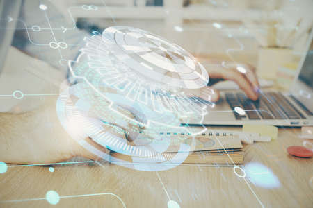 A man working on computer with technology theme drawing. Concept of big data. Multi exposure.