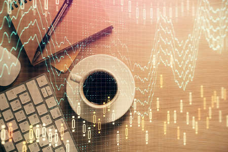 Multi exposure of forex chart drawing and work table top veiw. Concept of financial analysis.
