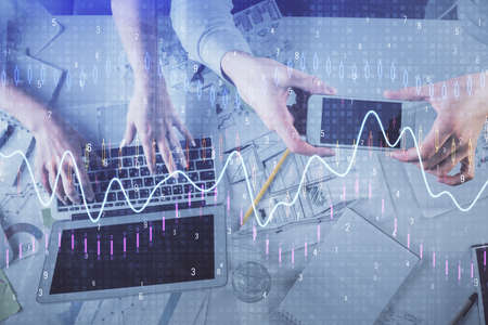 Multi exposure of man and woman working together and forex graph hologram drawing. Financial...