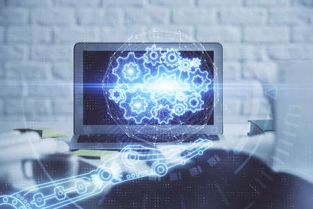 Multi exposure of desktop computer and technology theme hologram. Concept of software development.
