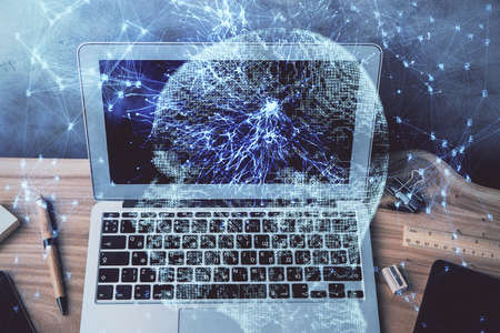 Multi exposure of work space with computer and human brain hologram. Brainstorm concept.の写真素材