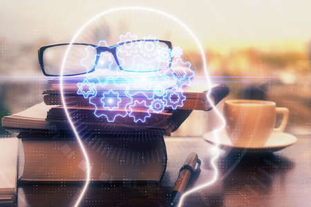 Brain drawings with glasses on the table background. Double exposure.