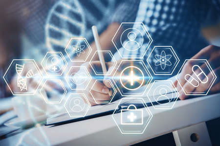 Mans hands working with notes background. Genetic engineering and gene manipulation concept. Multi exposure.の写真素材