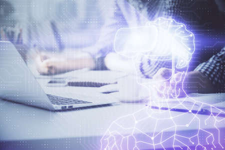 AR hologram with man working on computer on background. Augmented reality concept. Double exposure.