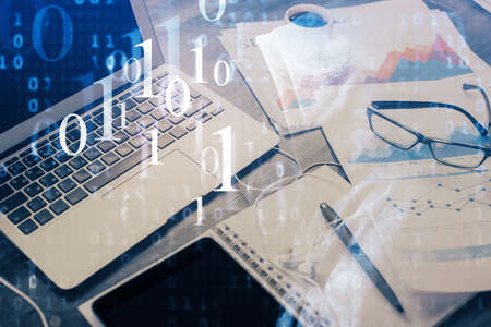 Double exposure of table with computer on background and data theme drawing. Concept of innovation.