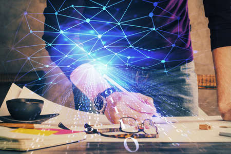 Mans hands with technology theme multi exposure icons. Concept of big data.