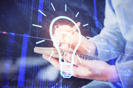 Innovative your business. Idea concept icon on writing mans hand background. Multi exposure.